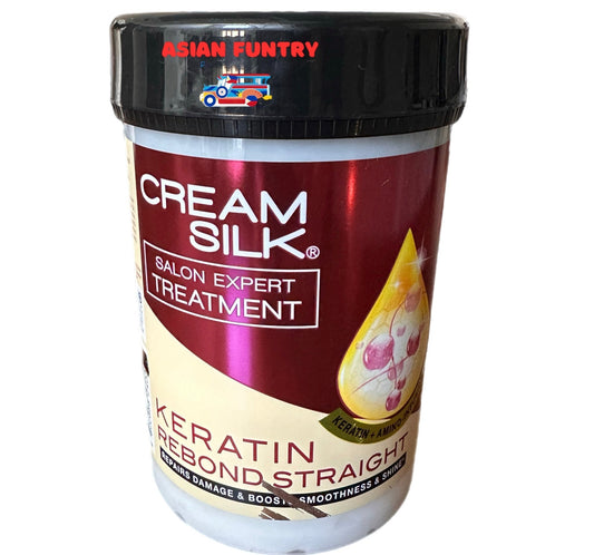 Cream Silk Salon Expert Treatment - Keratin Rebond Straight 650ml is a professional-grade hair treatment designed to repair damage and restore hair health. Enriched with keratin, it strengthens hair fibers while boosting smoothness and shine for a sleek, straight finish. Ideal for easy at-home use, this treatment helps maintain salon-quality results by deeply nourishing and revitalizing your hair.